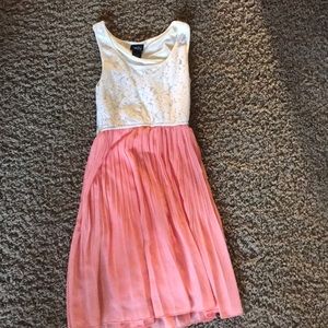 Tank dress and is lacy at the top